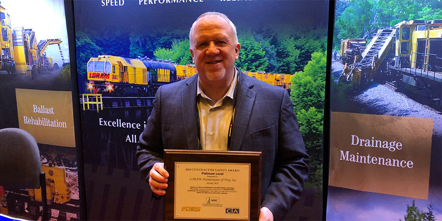Posing with 2018 NRC platinum safety award